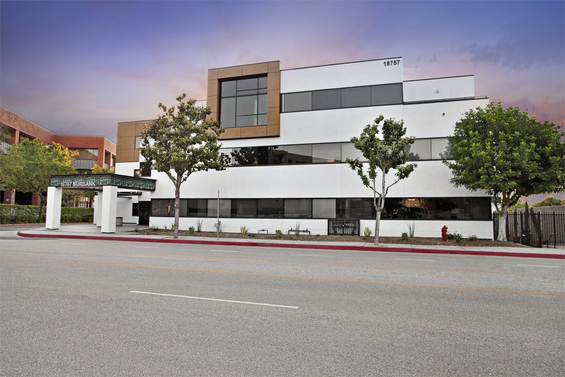 Commercial street elevation photographed near dusk