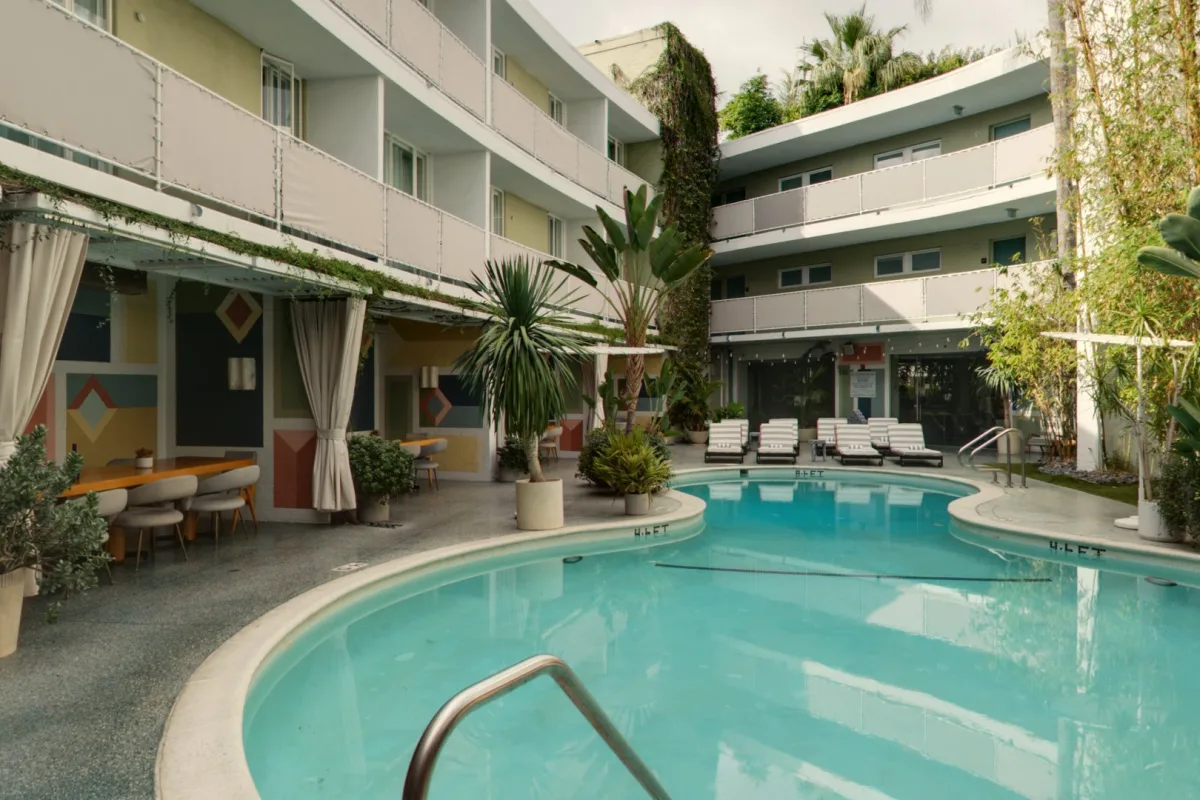 The Avalon Hotel pool courtyard with its curved mid-century balconies in Beverly Hills