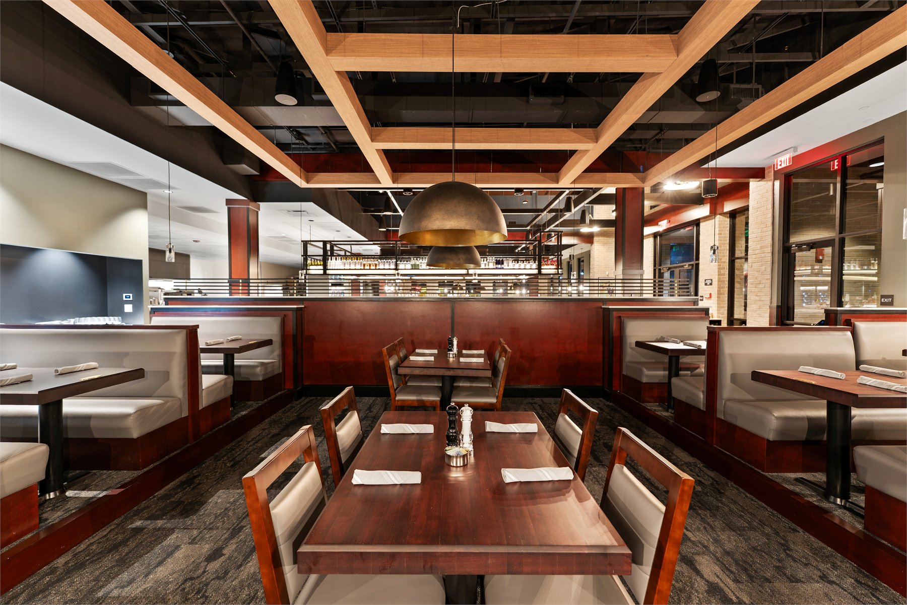 Hospitality lounge photographed for a warm guest experience read