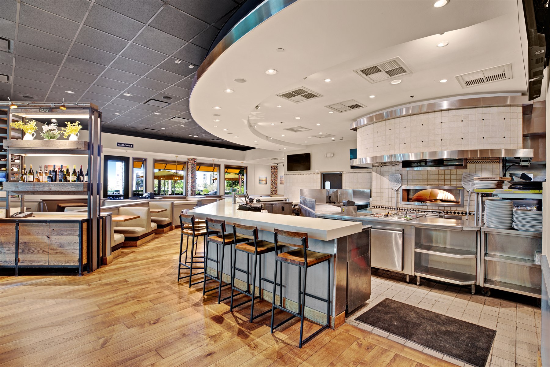 Hospitality service counter and open kitchen photographed for venue marketing