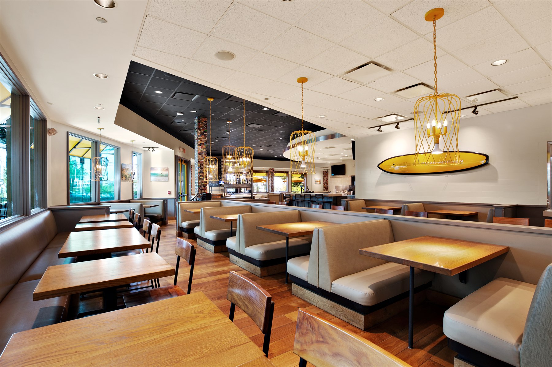 Hospitality booth seating photographed with warm restaurant atmosphere