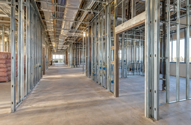 Interior metal framing documented during a repeat progress visit