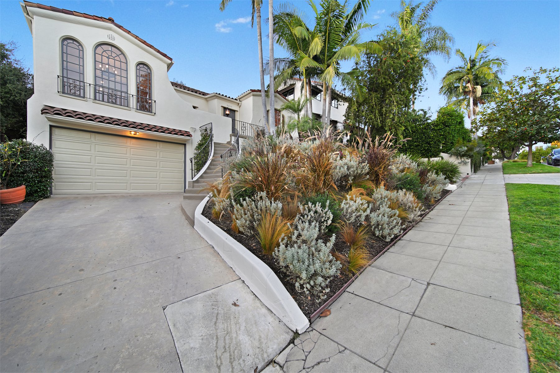 Residential driveway and exterior approach captured for listing media