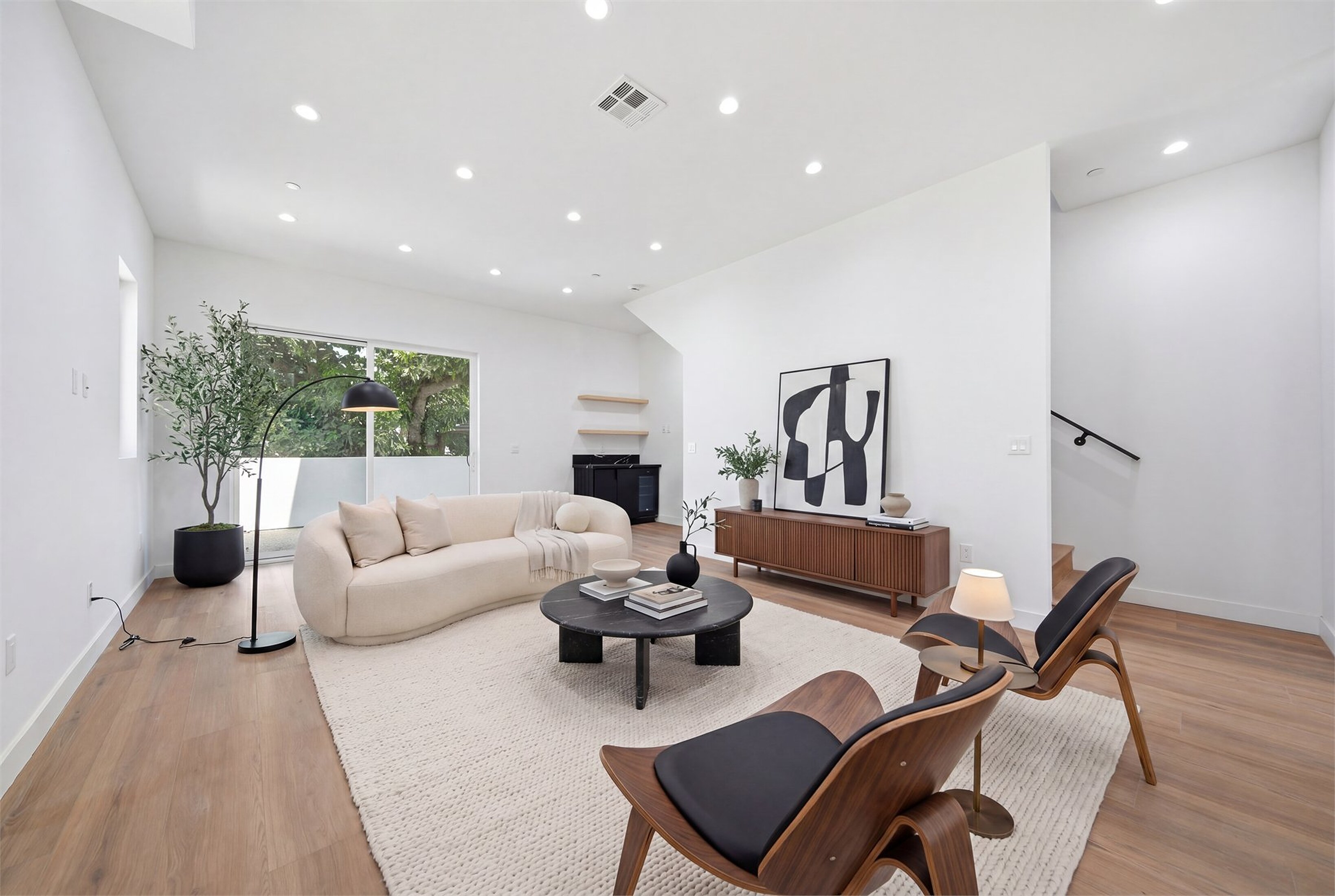 Virtually staged living room with warm furniture and decor