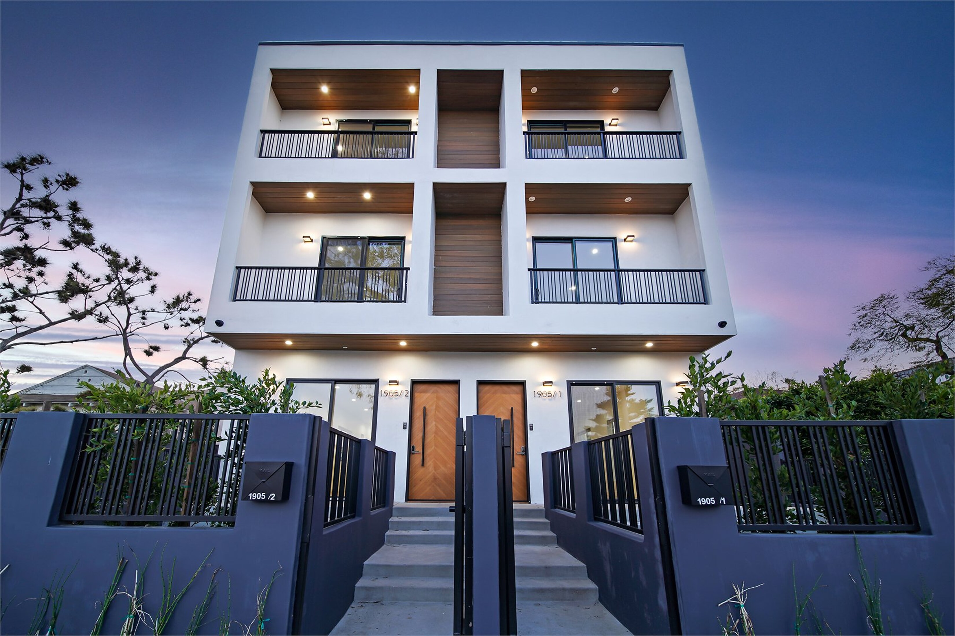 Twilight exterior photograph of a modern Los Angeles property