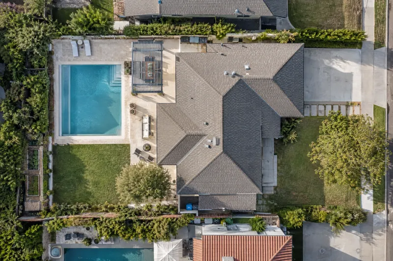 Daytime residential drone photo: backyard from above