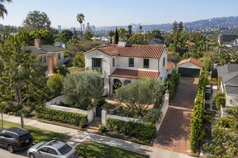 Daytime residential drone photo: spanish revival