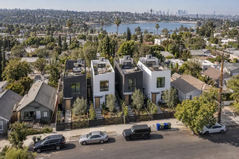 Daytime residential drone photo: townhome row
