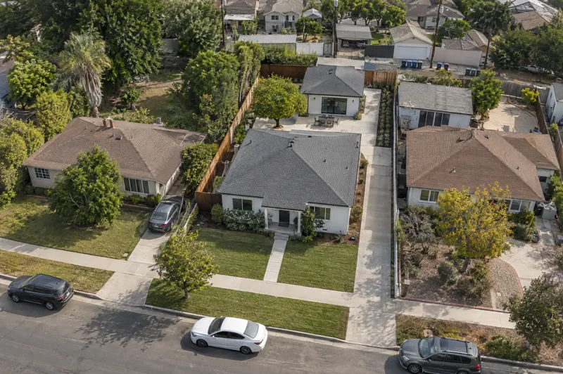 Daytime residential drone photo: adu backyard