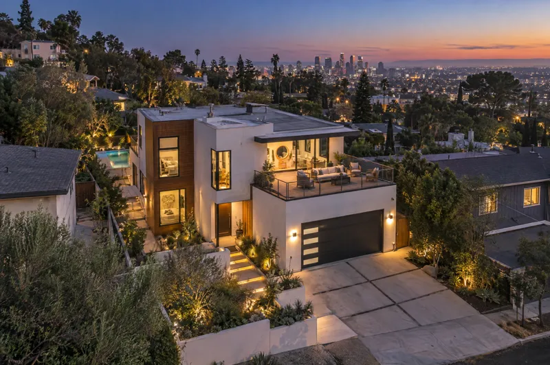 Hillside Modern home photographed at twilight from an aerial drone angle