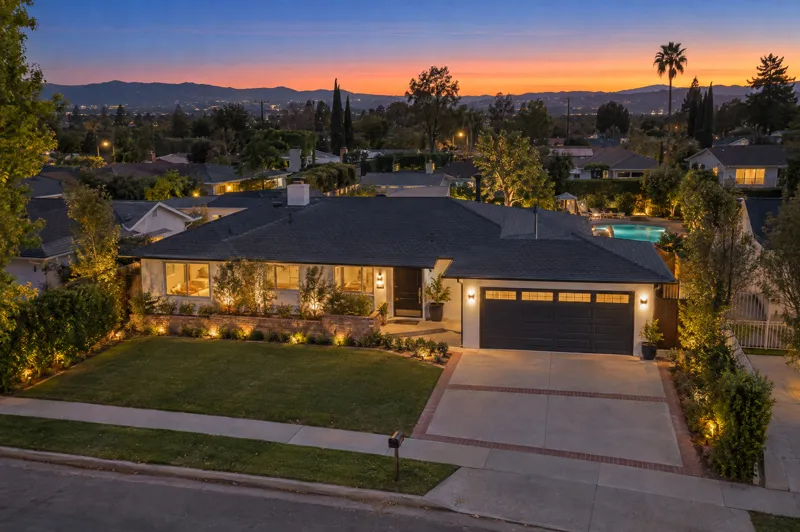 Remodeled Ranch home photographed at twilight from an aerial drone angle