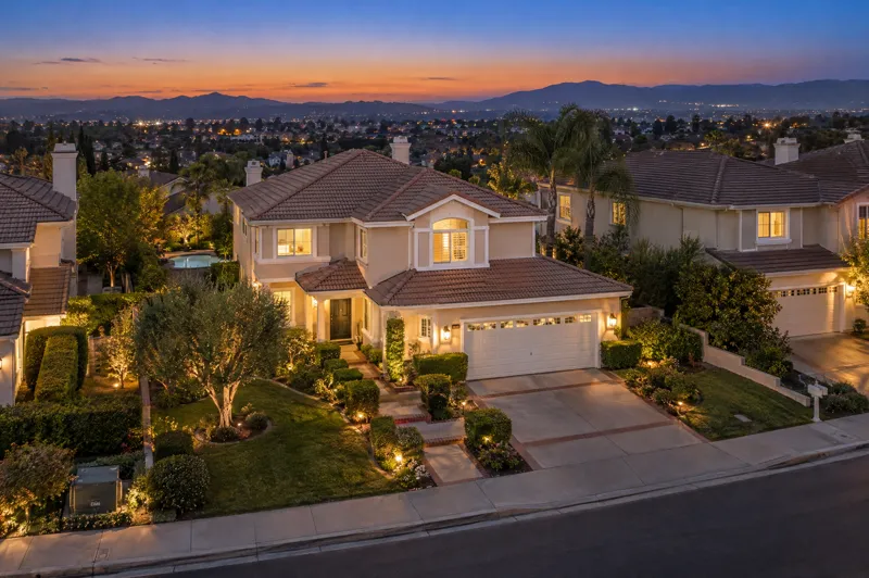 Traditional Two-Story home photographed at twilight from an aerial drone angle